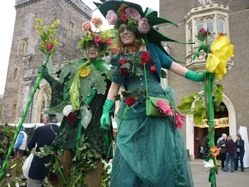 Green Man and Mother Nature Stilt Walkers at Powderham Castle Garden Festival